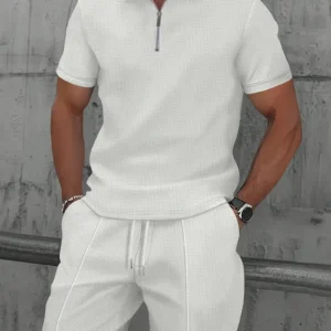 Conjunto manga corta con cremallera y pantalones cortos