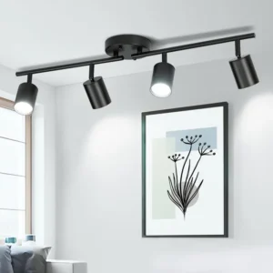 Este fijo de iluminación de 23,6" cuenta con un foco de techo de 4 luces con brazos y cabezas ajustables
